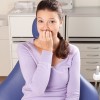 Woman Nervous In Dental Chair