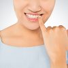 Woman Checking Teeth