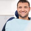 Smiling Man in Dental Office