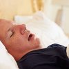 Man with Sleep Apnea Snoring