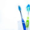 Toothbrushes in a Glass